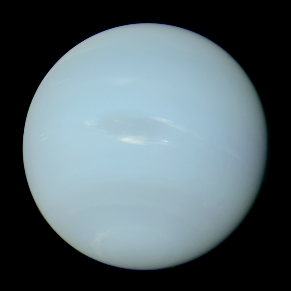 faint blue glossy cloudy surface of planet Neptune set against a black background